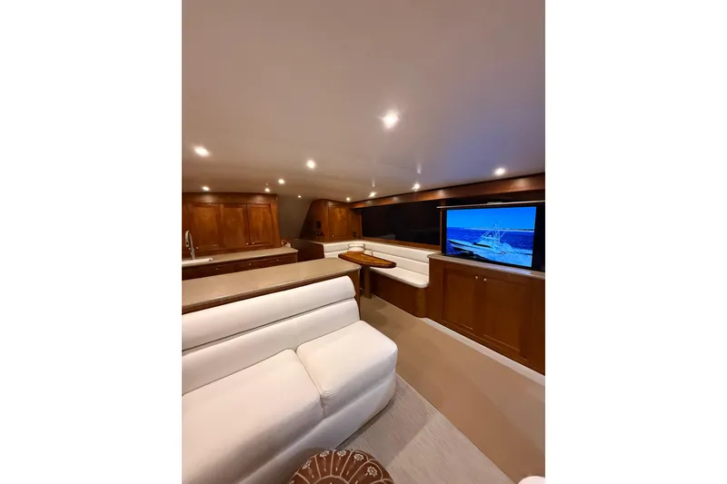 Slide: The Image of Luxurious interior of 2006 Blackwell 66 Convertible yacht with plush seating and modern amenities. - 23