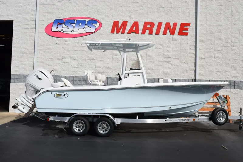 The Image of 2026 Sea Hunt Ultra 219 boat on trailer at GSPS Marine dealership. - 1