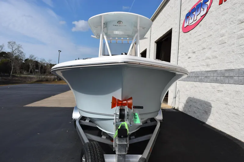 Slide: The Image of 2026 Sea Hunt Ultra 219 boat on trailer outside dealership. - 3