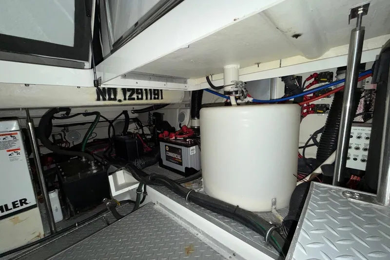 Slide: The Image of Engine compartment of 2017 Formula 430 Super Sport Crossover with batteries and wiring. - 14