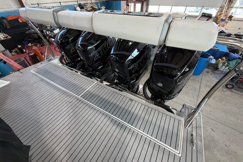 Slide: The Image of 2017 Formula 430 Super Sport Crossover with powerful outboard engines in a workshop setting. - 18