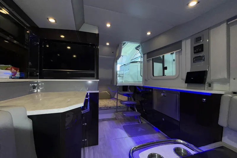 Slide: The Image of Luxurious interior of a 2017 Formula 430 Super Sport Crossover boat with modern amenities. - 31