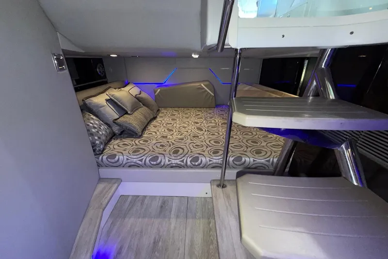 Slide: The Image of 2017 Formula 430 Super Sport Crossover cabin with modern interior and stylish bedding. - 32