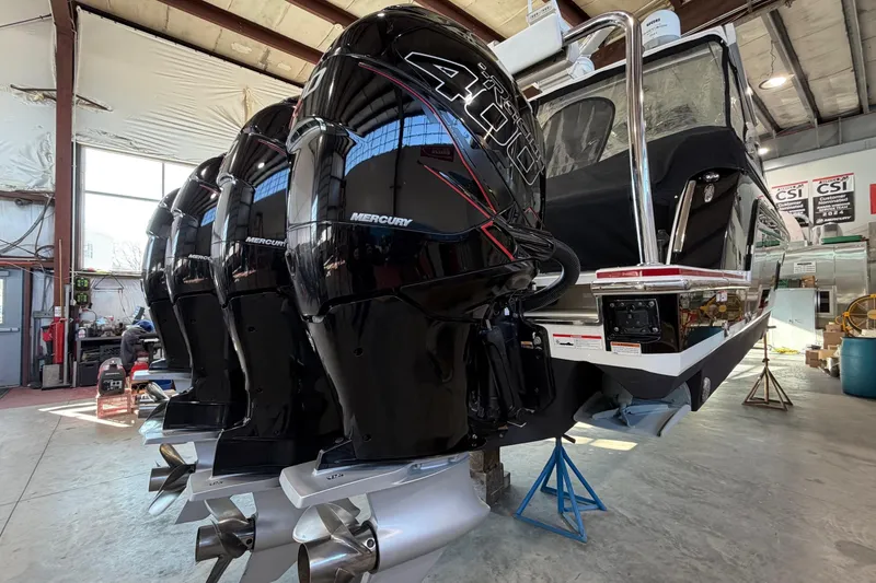 Slide: The Image of 2017 Formula 430 Super Sport Crossover with Mercury engines in a workshop setting. - 4