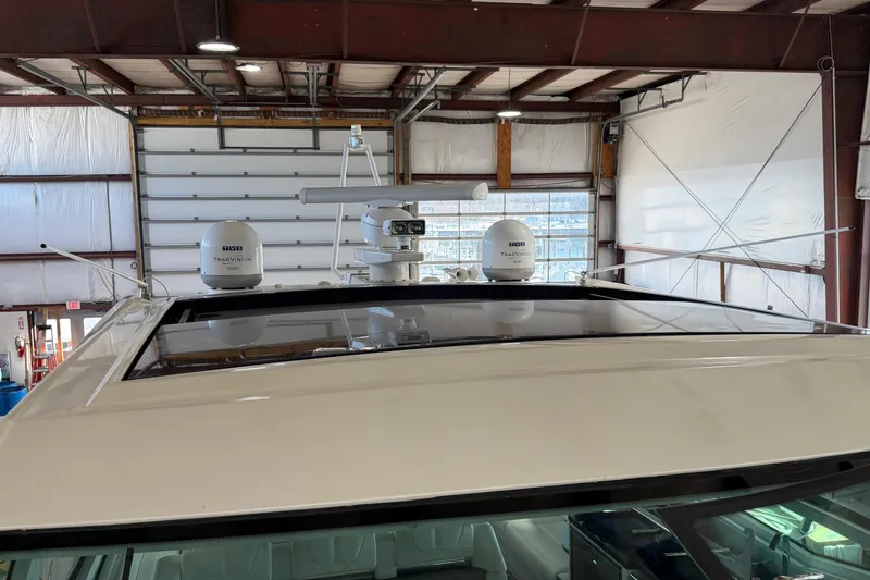 Slide: The Image of 2017 Formula 430 Super Sport Crossover yacht roof with radar and satellite equipment. - 41