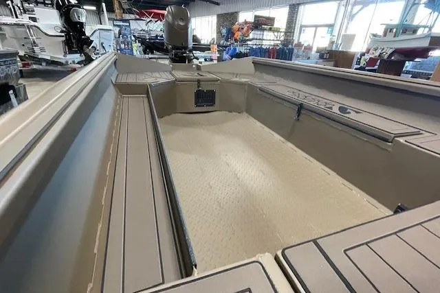 Slide: The Image of 2026 Reaper Boats 753-1878 model, interior view in showroom setting. - 8