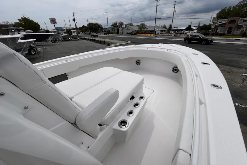 Slide: The Image of 2025 Fountain 34 Tournament Edition boat with sleek white seating and modern design. - 13