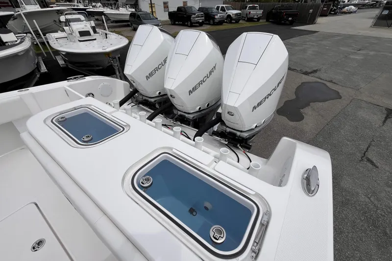 Slide: The Image of 2025 Fountain 34 Tournament Edition boat with triple Mercury outboard engines. - 20