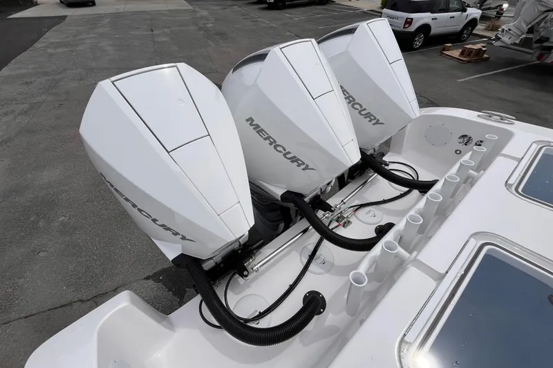 Slide: The Image of Triple Mercury outboard engines on 2025 Fountain 34 Tournament Edition boat. - 6