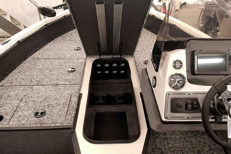 Slide: The Image of 2026 Ranger VS1682SC Angler boat interior with dashboard and storage compartments. - 11