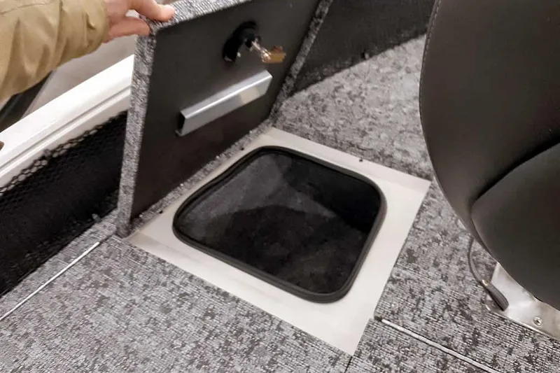 Slide: The Image of 2026 Ranger VS1682SC Angler boat interior with storage compartment and seating. - 14