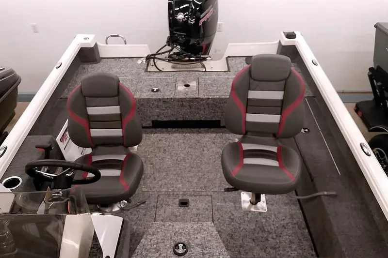 Slide: The Image of 2026 Ranger VS1682SC Angler boat interior with two seats and steering console. - 16