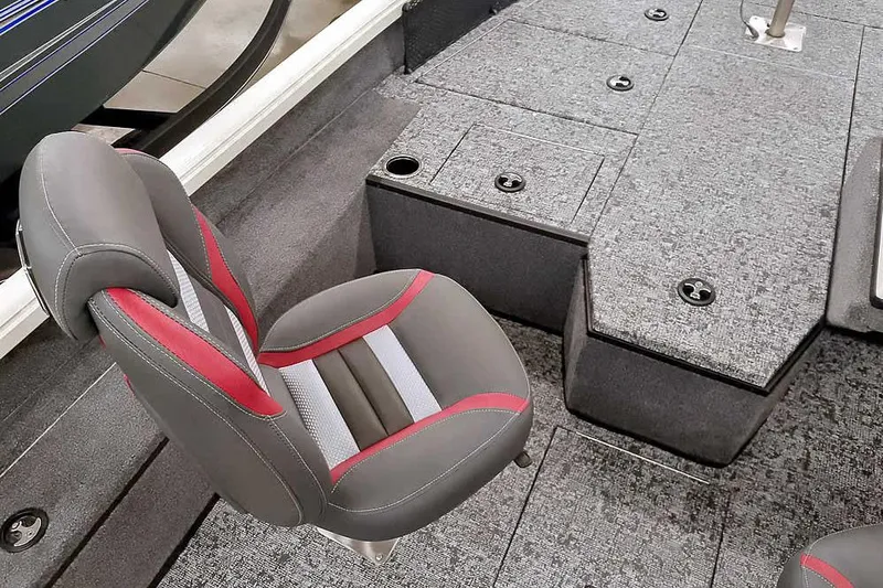 Slide: The Image of 2026 Ranger VS1682SC Angler boat interior with gray and red seating, carpeted storage compartments. - 17