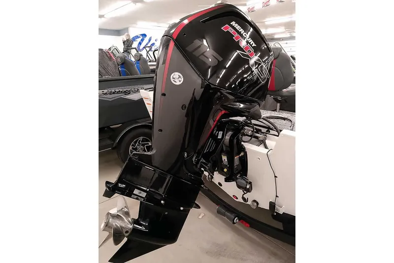 Slide: The Image of 2026 Ranger VS1682SC Angler with Mercury Pro XS outboard motor in showroom. - 2