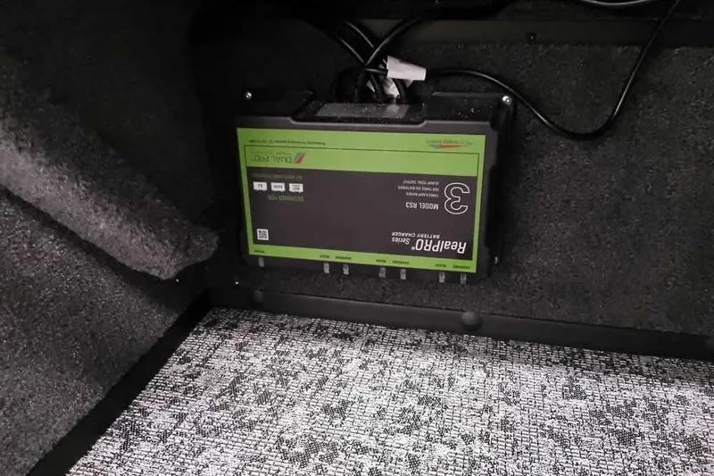 Slide: The Image of Battery charger installed in 2026 Ranger VS1682SC Angler boat interior. - 28