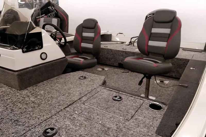 Slide: The Image of 2026 Ranger VS1682SC Angler boat interior with seating and steering console. - 7