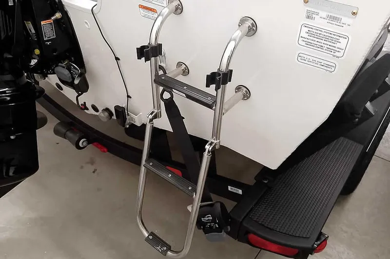 Slide: The Image of 2026 Ranger VS1682SC Angler boat with stainless steel boarding ladder and motor. - 9