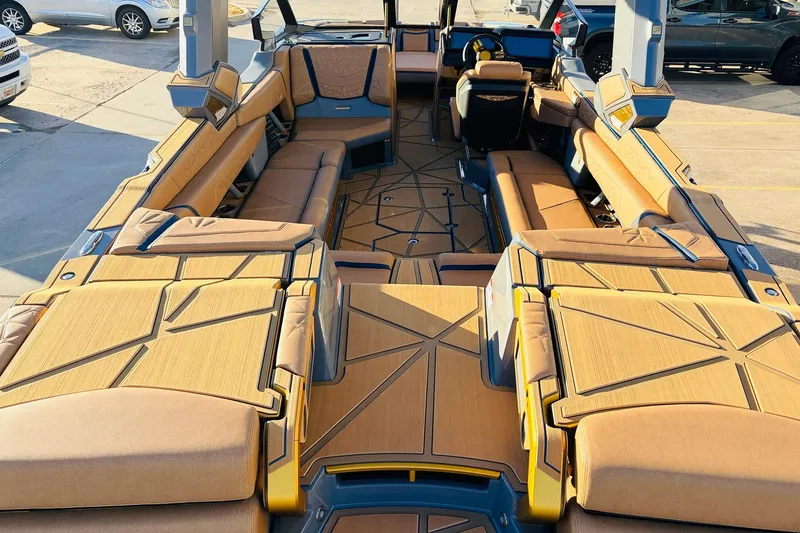Slide: The Image of Luxurious interior of 2026 Nautique Super Air Nautique G25 Paragon boat. - 13