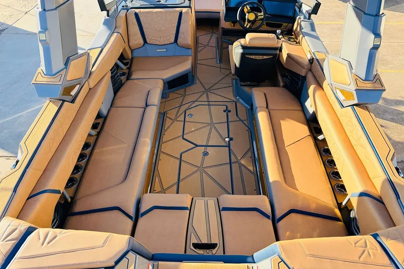 Slide: The Image of Luxurious interior of 2026 Nautique Super Air Nautique G25 Paragon boat. - 14
