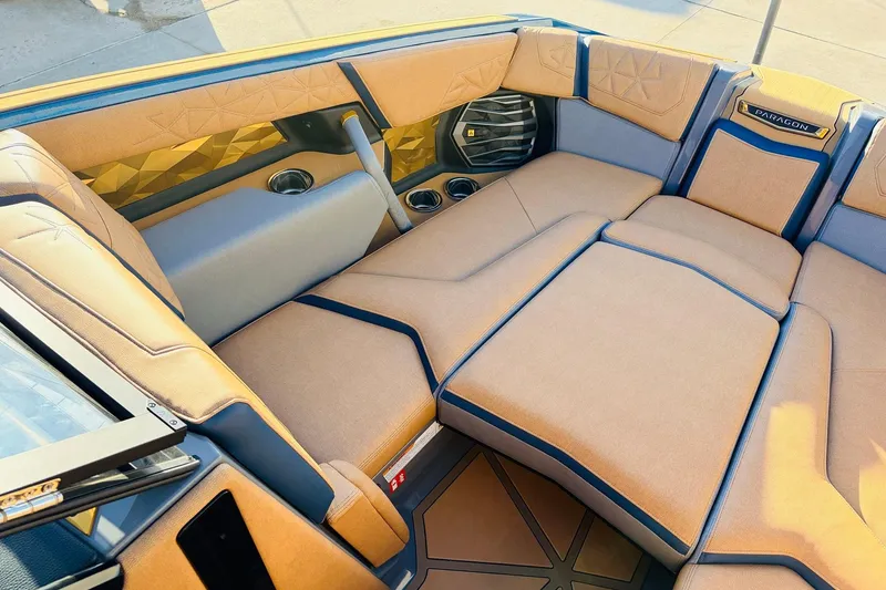 Slide: The Image of Luxurious interior of 2026 Nautique Super Air Nautique G25 Paragon boat. - 16