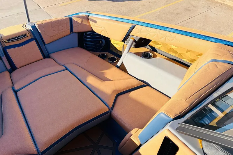 Slide: The Image of Luxurious interior of 2026 Nautique Super Air Nautique G25 Paragon boat. - 17