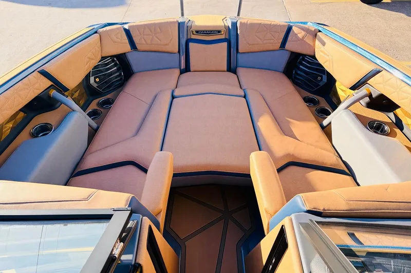 Slide: The Image of Luxurious interior of 2026 Nautique Super Air Nautique G25 Paragon boat. - 18