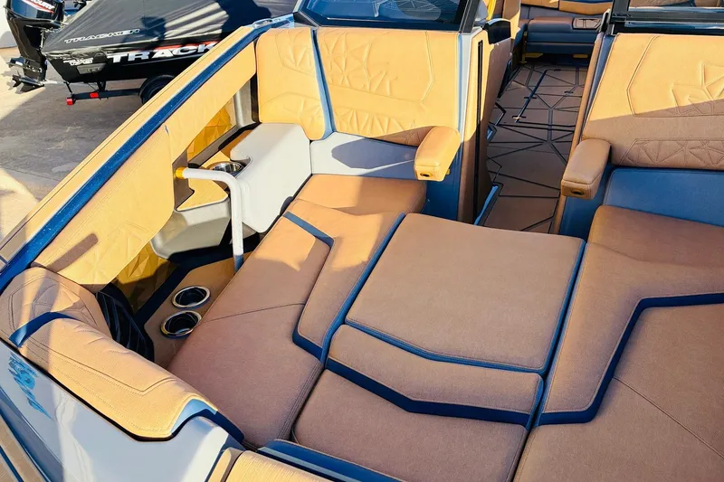 Slide: The Image of Luxurious interior of 2026 Nautique Super Air Nautique G25 Paragon boat. - 21