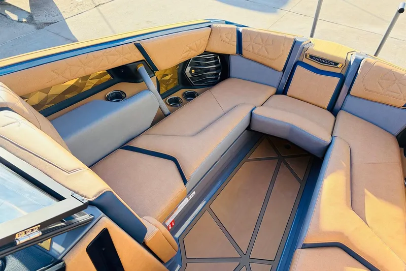 Slide: The Image of Luxurious interior of 2026 Nautique Super Air Nautique G25 Paragon boat. - 22