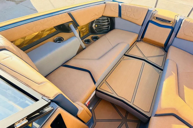 Slide: The Image of Luxurious interior of 2026 Nautique Super Air Nautique G25 Paragon boat with elegant seating. - 31