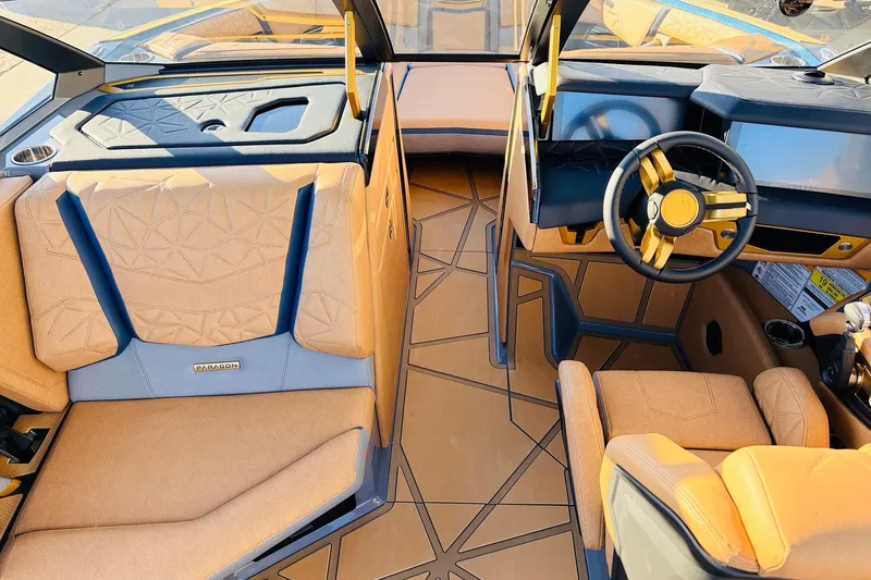 Slide: The Image of 2026 Nautique Super Air Nautique G25 Paragon interior with luxurious seating and modern dashboard design. - 33