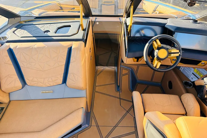 Slide: The Image of Luxurious interior of 2026 Nautique Super Air Nautique G25 Paragon boat, featuring modern design. - 34