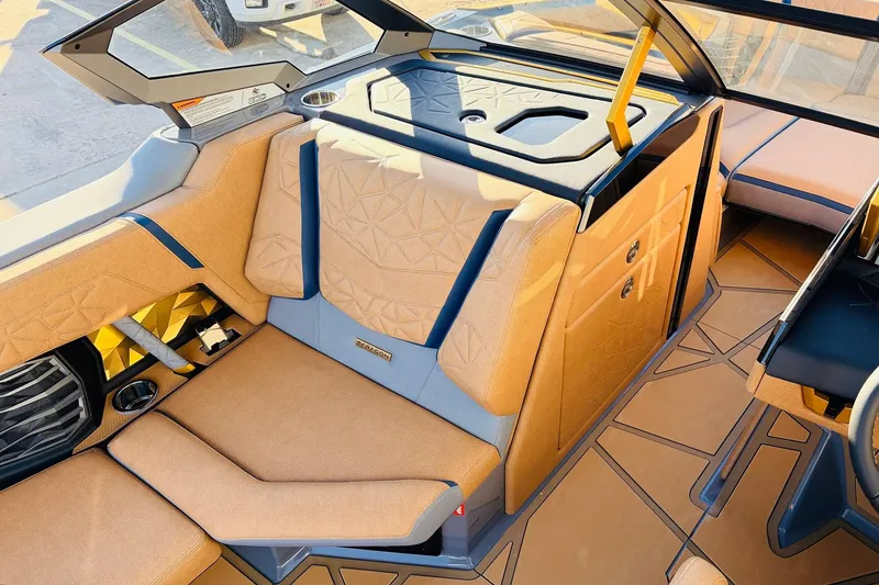 Slide: The Image of Luxurious interior of 2026 Nautique Super Air Nautique G25 Paragon boat. - 35