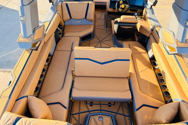 Slide: The Image of 2026 Nautique Super Air Nautique G25 Paragon interior with luxurious seating and modern design. - 52