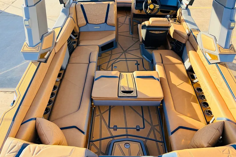 Slide: The Image of 2026 Nautique Super Air Nautique G25 Paragon interior with luxurious seating and modern design. - 54