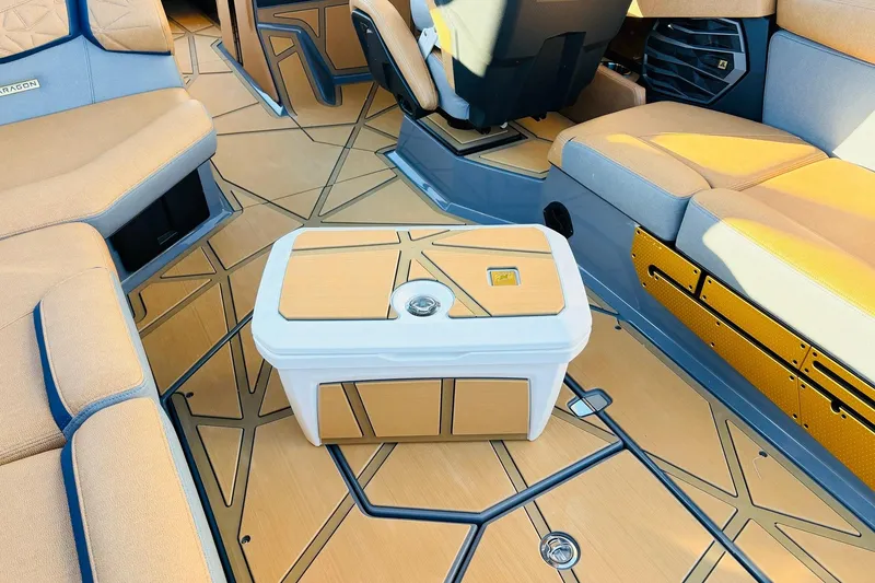 Slide: The Image of 2026 Nautique Super Air Nautique G25 Paragon interior with stylish seating and flooring. - 73