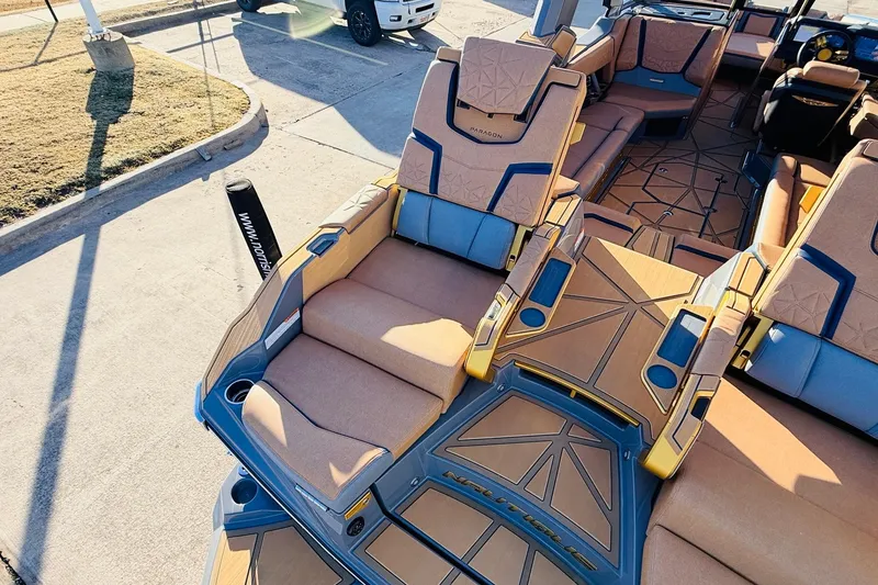 Slide: The Image of 2026 Nautique Super Air Nautique G25 Paragon interior with luxurious seating and modern design. - 80