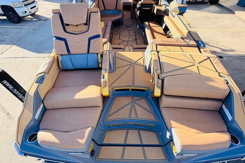 Slide: The Image of 2026 Nautique Super Air Nautique G25 Paragon interior with luxurious seating and modern design. - 82