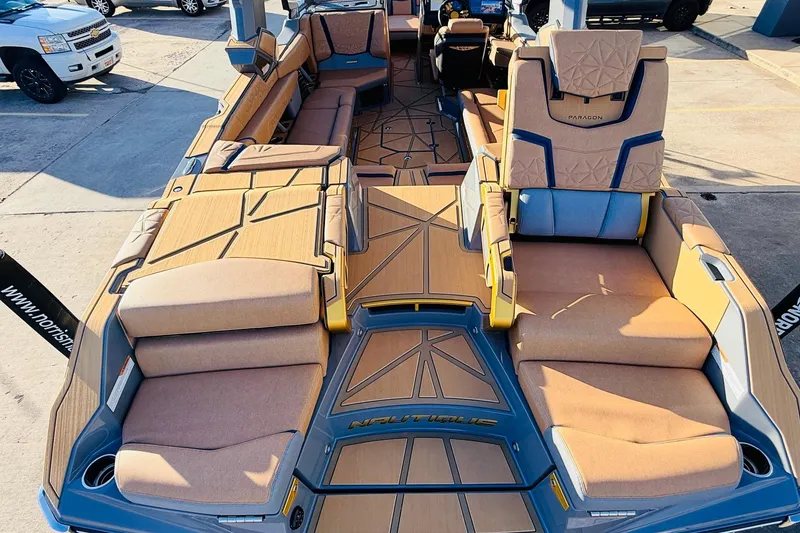 Slide: The Image of 2026 Nautique Super Air Nautique G25 Paragon interior with luxurious seating and modern design. - 83