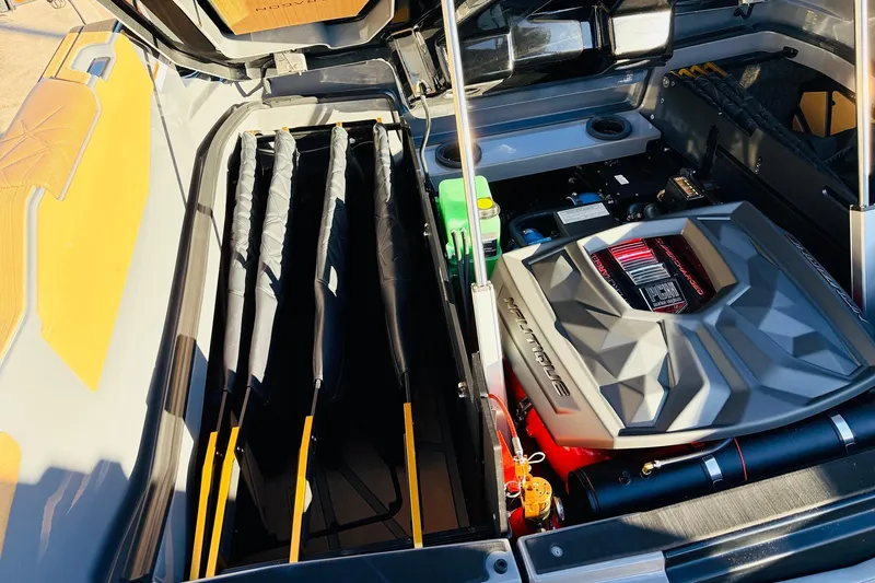 Slide: The Image of Engine compartment of 2026 Nautique Super Air Nautique G25 Paragon boat. - 91