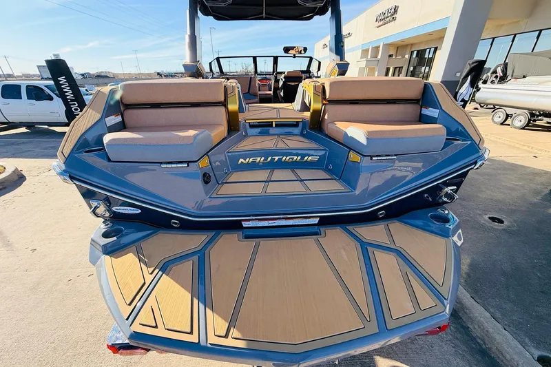 Slide: The Image of 2026 Nautique Super Air Nautique G25 Paragon boat with luxurious seating and sleek design. - 93