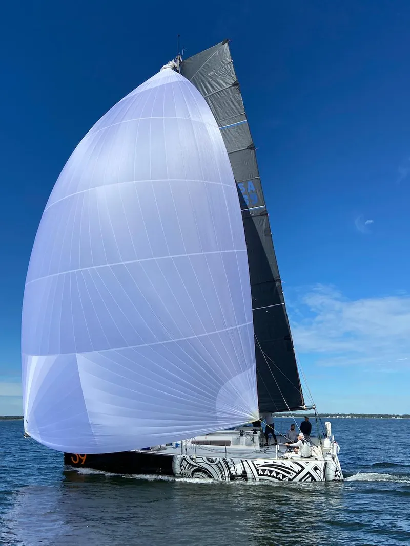 Slide: The Image of Sailboat Class 40 Akilaria MK1, 2007, on calm waters. - 2