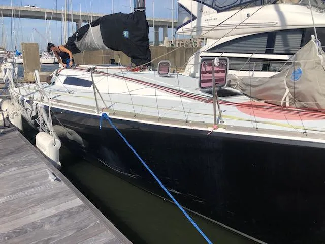 Slide: The Image of 2007 Akilaria MK1 Class 40 sailboat docked in harbor. - 6