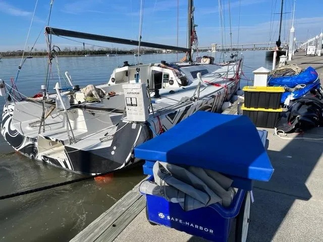 Slide: The Image of 2007 Akilaria MK1 sailboat docked on a sunny day. - 9