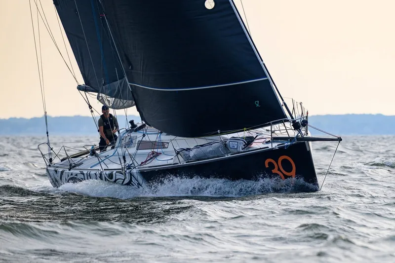The Image of Sailing yacht Class 40 Akilaria MK1 (2007) navigating through waves, number 39 visible. - 0