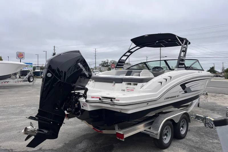 Slide: The Image of 2025 Chaparral 23 SSi OB boat with Mercury outboard engine on trailer. - 3