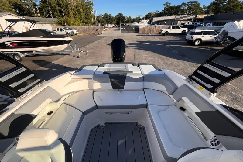 Slide: The Image of 2025 Chaparral 23 SSi OB boat interior with spacious seating and modern design. - 7