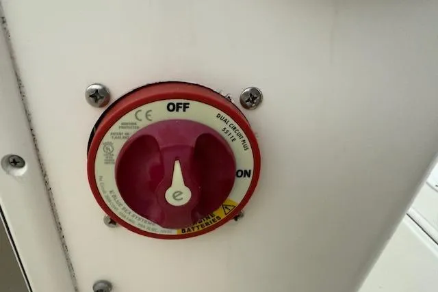 Slide: The Image of Battery switch on a 2020 Pioneer 202 Islander boat, showing "Off" and "On" positions. - 7