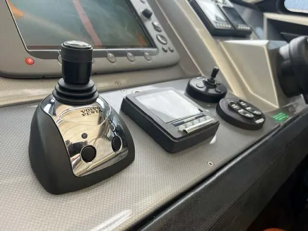 Slide: The Image of Control panel of a 2008 Marquis 40 SC yacht with joystick and navigation systems. - 20