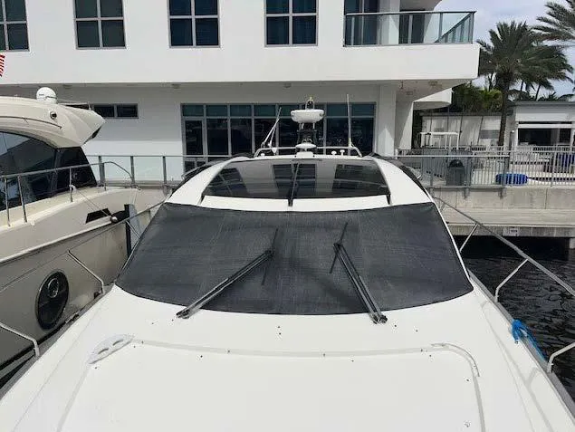 Slide: The Image of 2008 Marquis 40 SC yacht docked at marina, front view. - 22