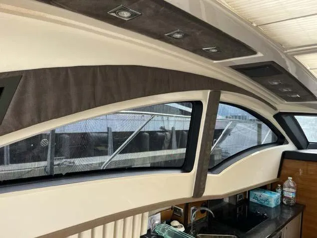 Slide: The Image of Interior of 2008 Marquis 40 SC yacht with modern windows and sleek design. - 35